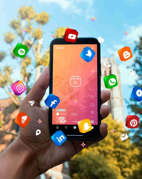 hand-holding-smartphone-social-media-concept (1) hand-holding-smartphone-social-media-concept (1)